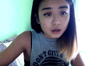 Chica asiática de webcam